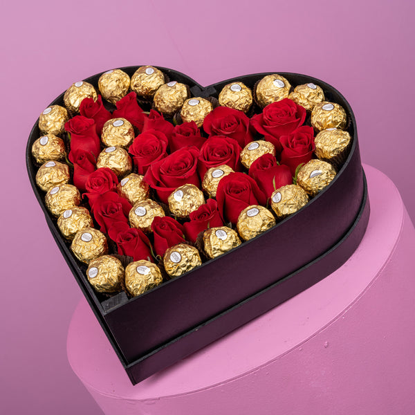 Caja Corazón con 20 rosas y chocolates – Floristería Nic & Eros