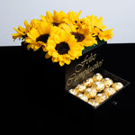 Caja de girasoles y chocolates