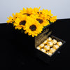 Caja de girasoles y chocolates