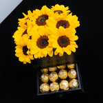 Caja de girasoles y chocolates