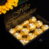 Caja de girasoles y chocolates