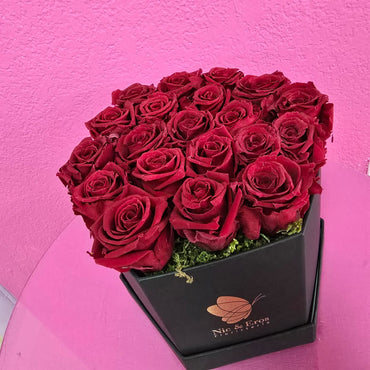 Rosas preservadas medianas en hexagono