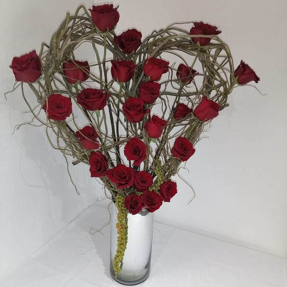 Corazón de rosas rojas